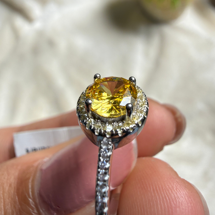 Yellow round gemstone halo ring with lab-grown diamonds by Kiashaa Jewellery.