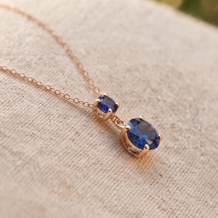 Kiashaa Jewellery 0.68 CTW blue round drop necklace in polished yellow gold.