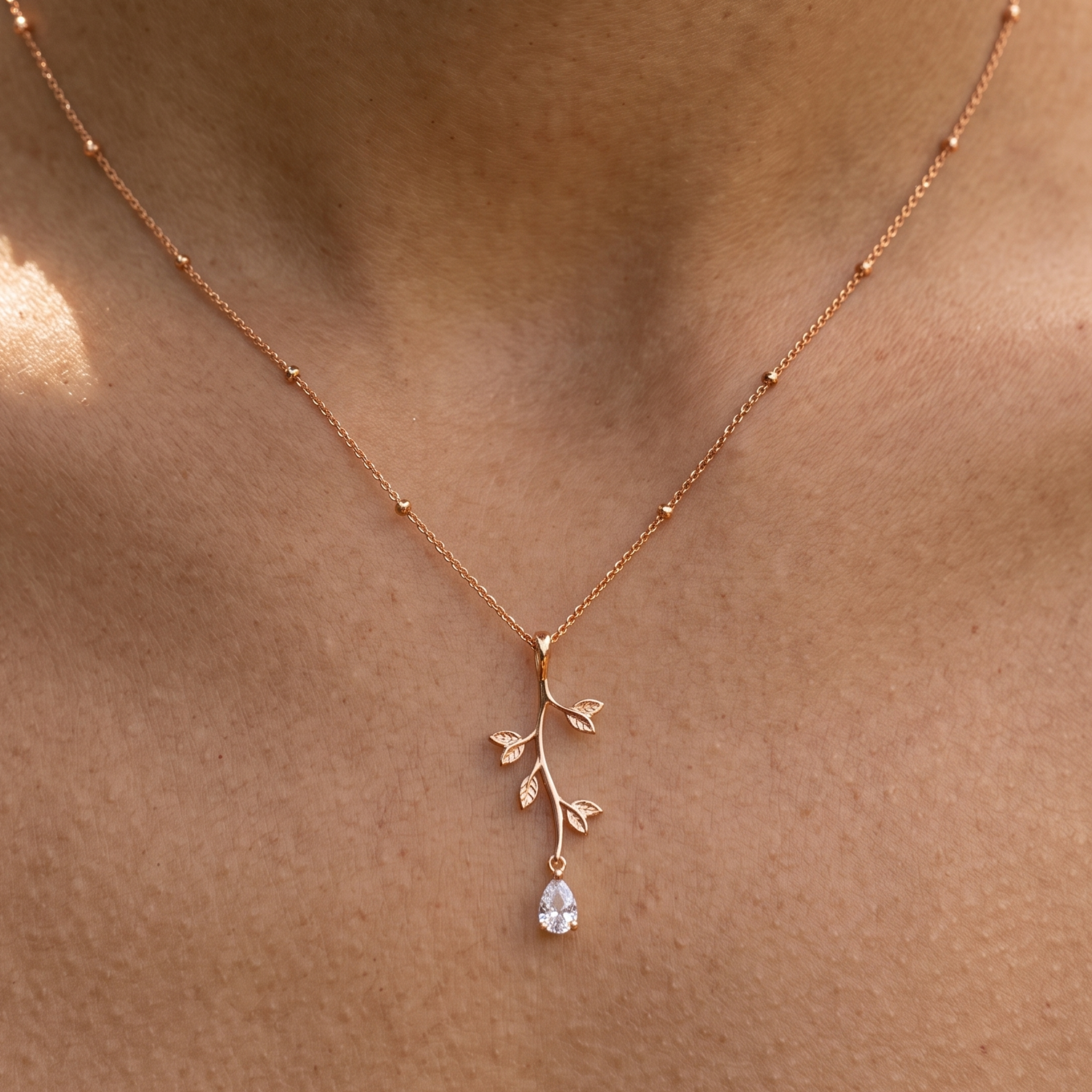 Kiashaa Jewellery 0.39 CT pear diamond leaf pendant necklace in polished yellow gold.