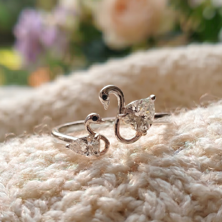 Swan Embrace 2.50 CTW lab-grown diamond ring by Kiashaa Jewellery with a 2 CT heart center and 0.50 CT pear side diamond.