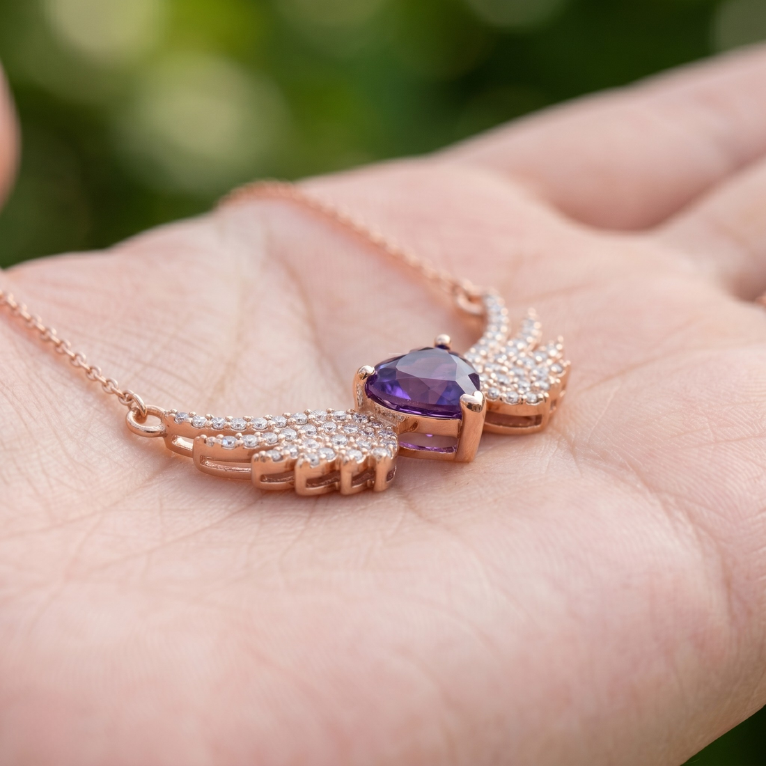 Purple heart gemstone angel wing pendant necklace in rose gold by Kiashaa Jewellery.