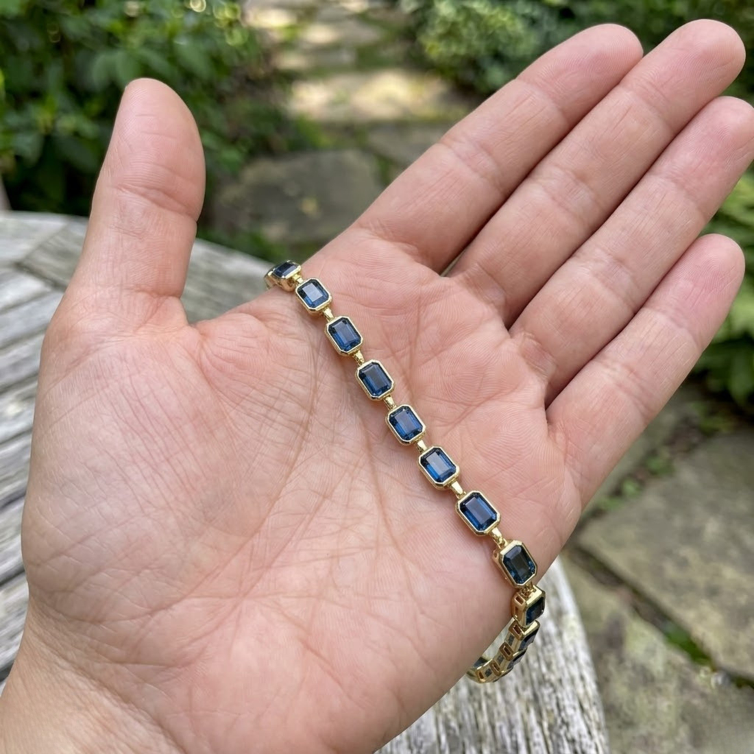 Classic gemstone tennis bracelet available in white, yellow, and rose gold.