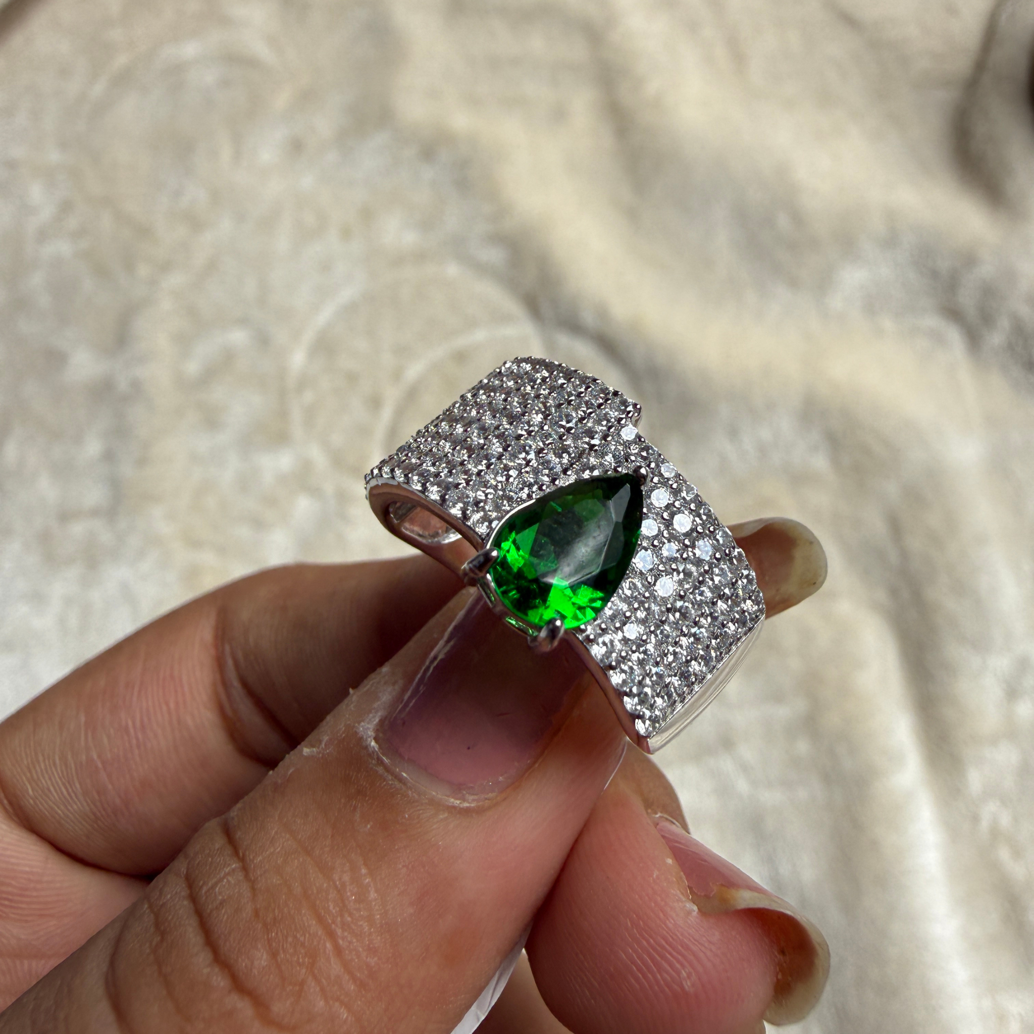 Green pear gemstone and pavé lab-grown diamond statement ring by Kiashaa Jewellery.