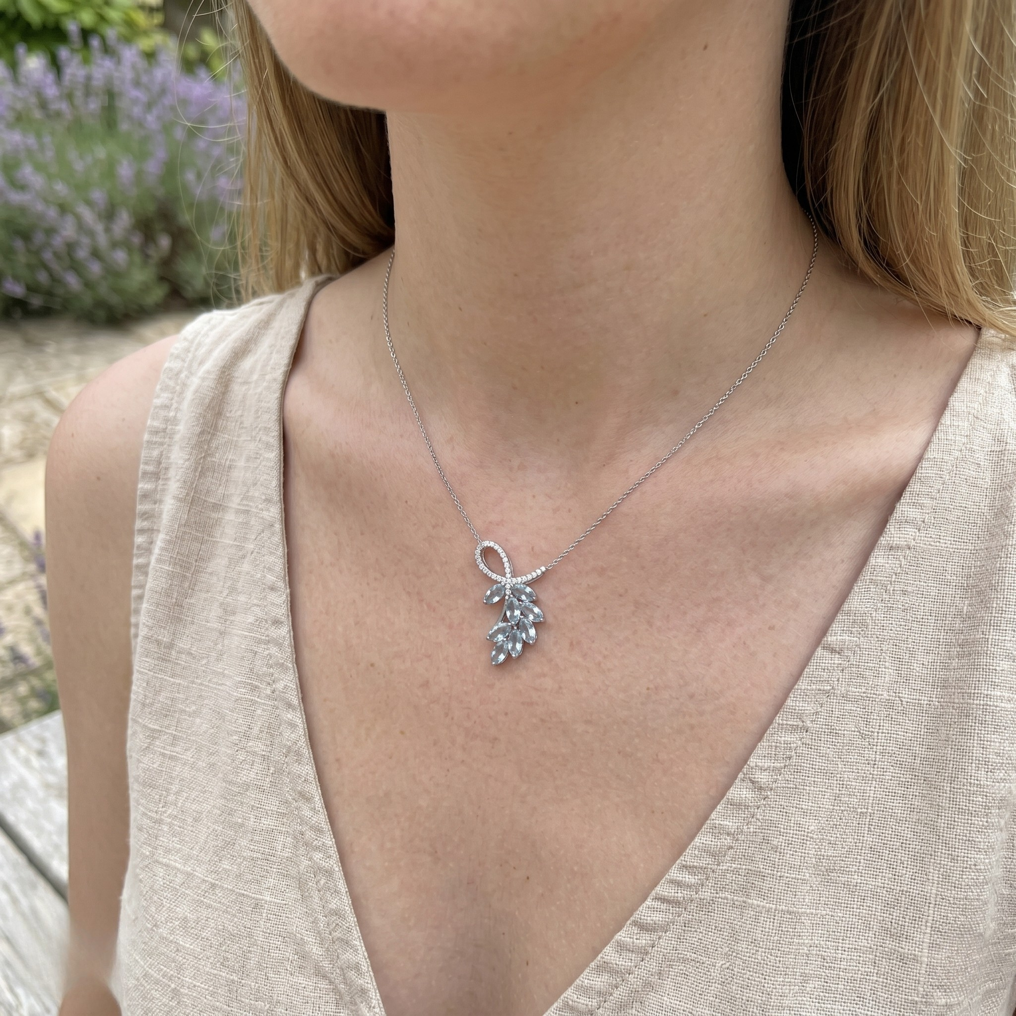 Sky blue marquise gemstone leaf pendant necklace with lab-grown diamonds by Kiashaa Jewellery.