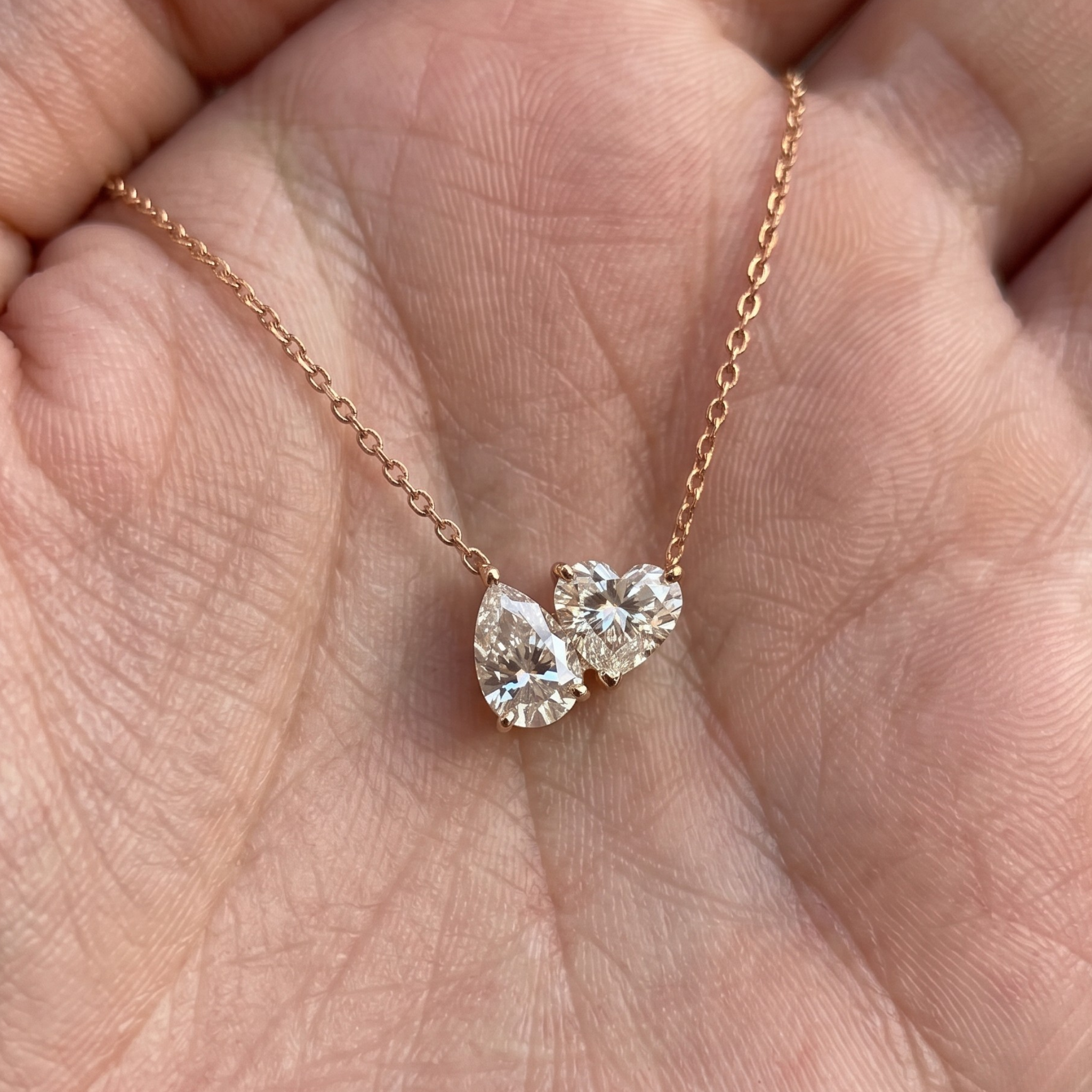 Kiashaa Jewellery 1.45 CTW pear and heart diamond necklace in polished yellow gold.