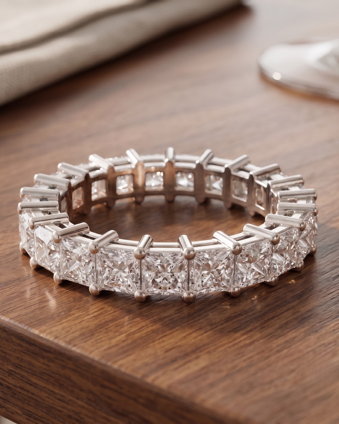 4 carat princess-cut eternity ring by Kiashaa Jewellery in 18K gold with continuous lab-grown diamonds.