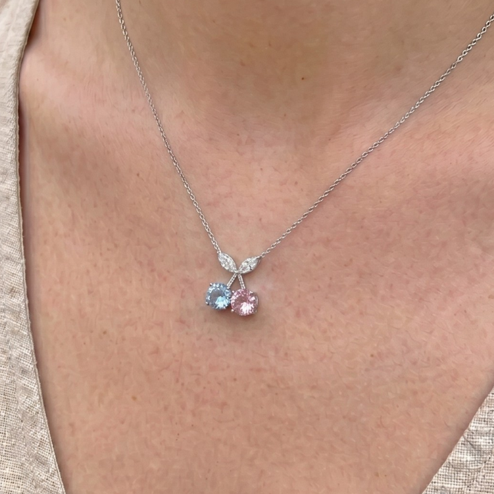 Blue and pink gemstone cherry pendant necklace with marquise lab-grown diamonds by Kiashaa Jewellery.