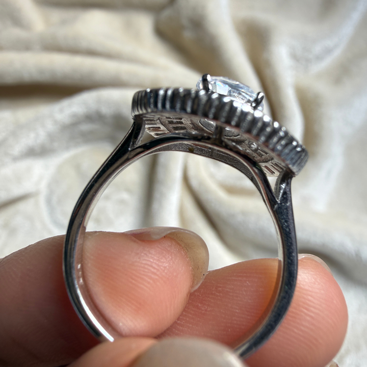 Oval and baguette lab-grown diamond double halo ring by Kiashaa Jewellery.