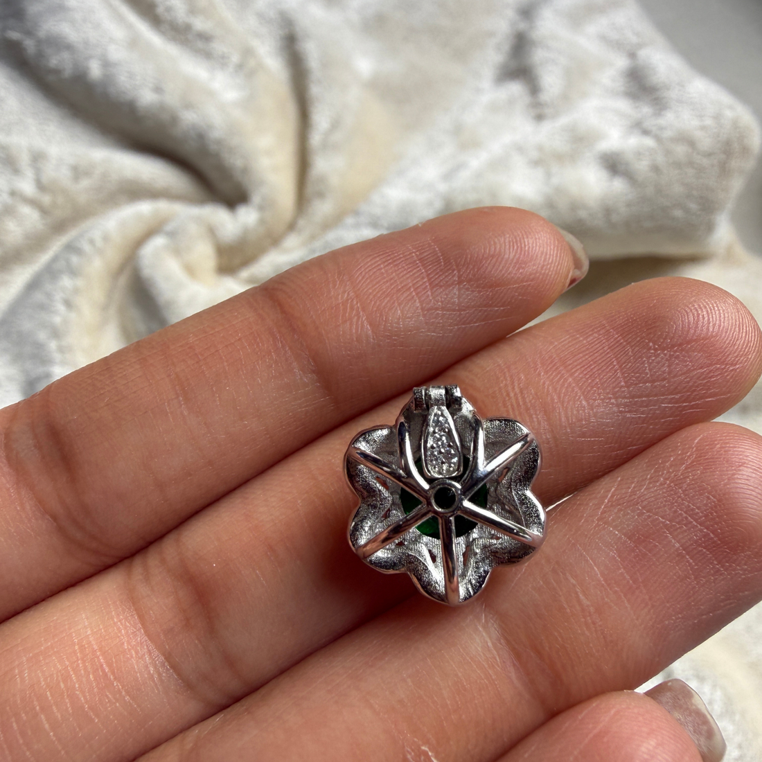 Green gemstone floral halo ring with lab-grown diamonds by Kiashaa Jewellery.