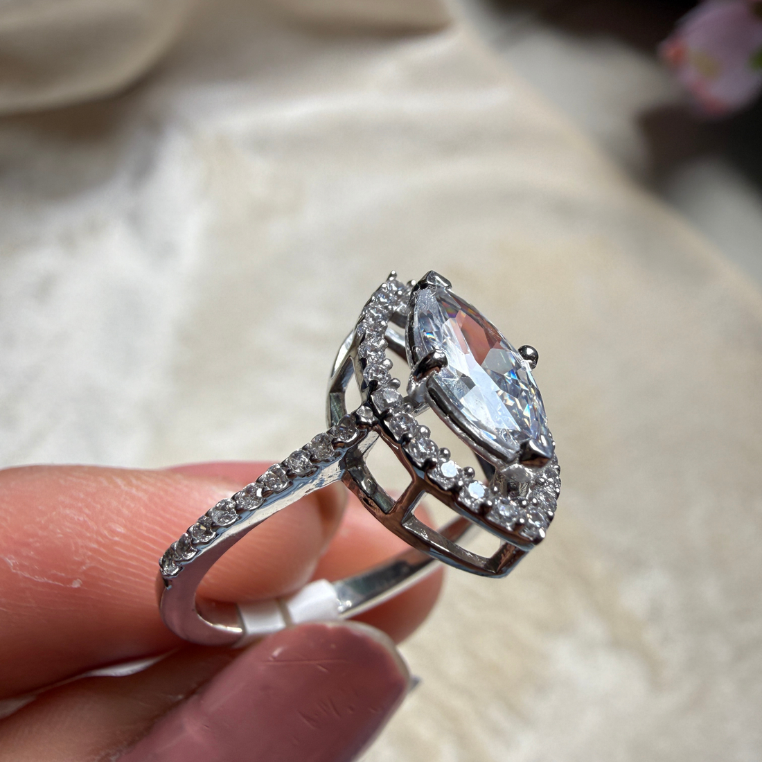 Marquise halo lab-grown diamond engagement ring in white gold by Kiashaa Jewellery.