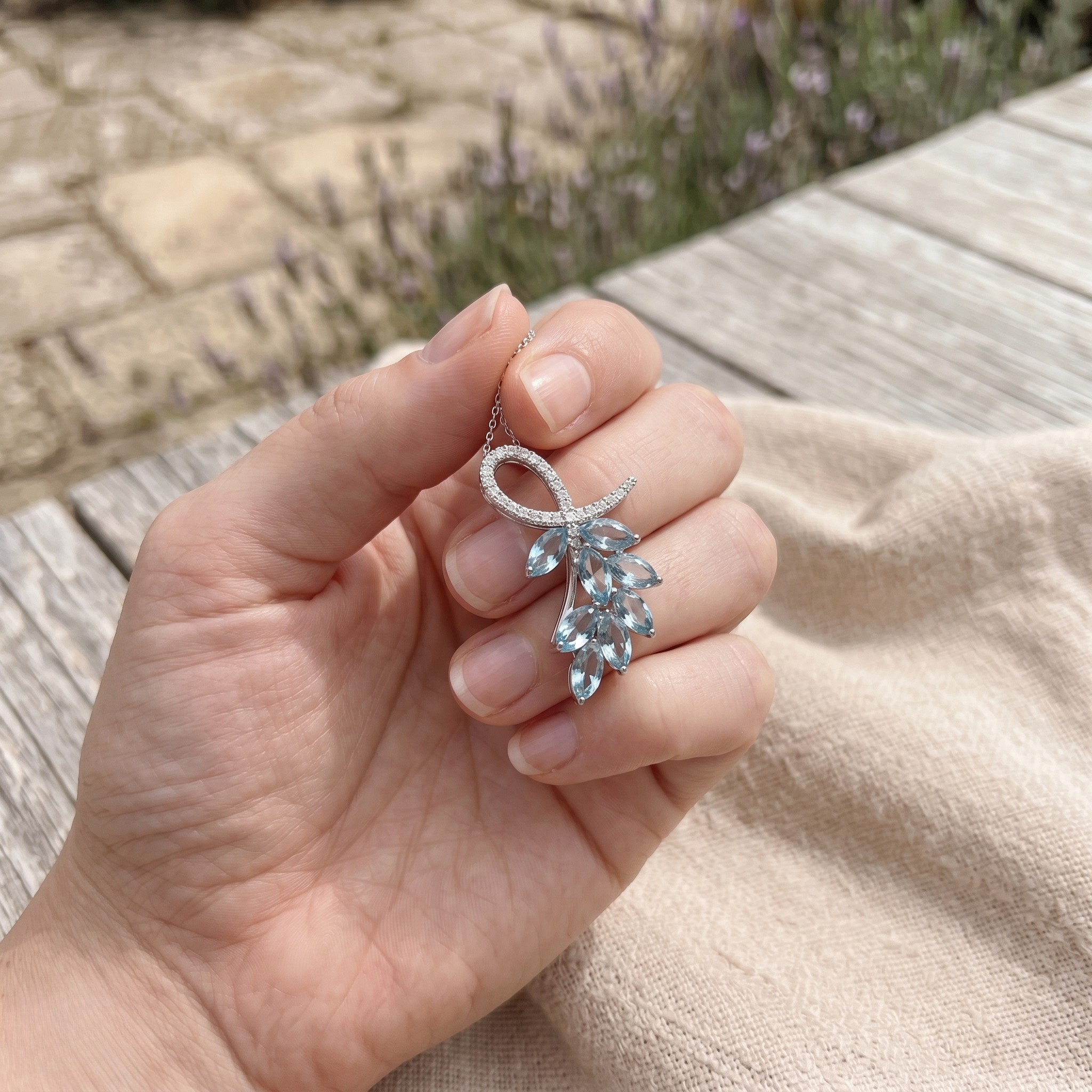 Sky blue marquise gemstone leaf pendant necklace with lab-grown diamonds by Kiashaa Jewellery.
