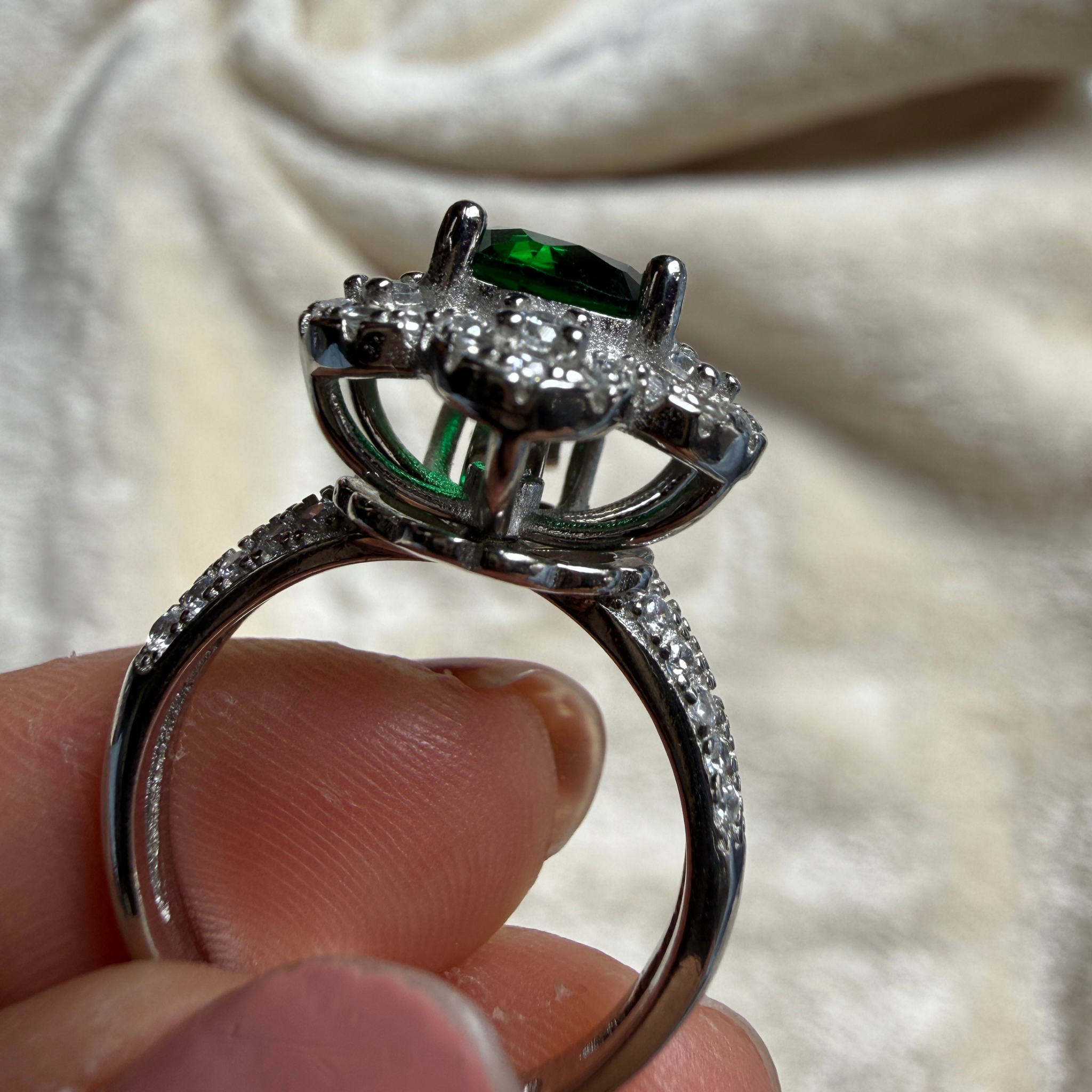 Green gemstone floral halo ring with lab-grown diamonds by Kiashaa Jewellery.