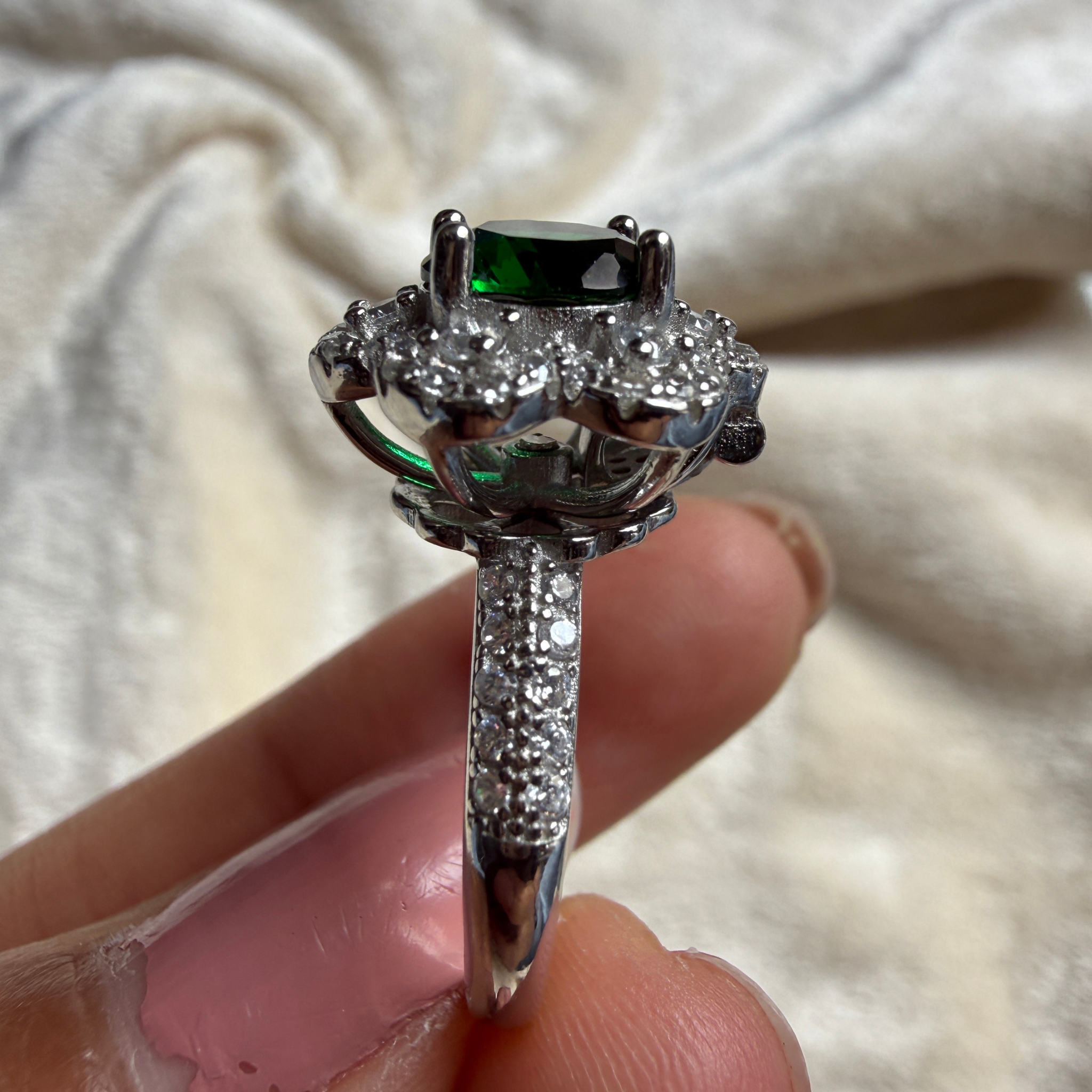 Green gemstone floral halo ring with lab-grown diamonds by Kiashaa Jewellery.
