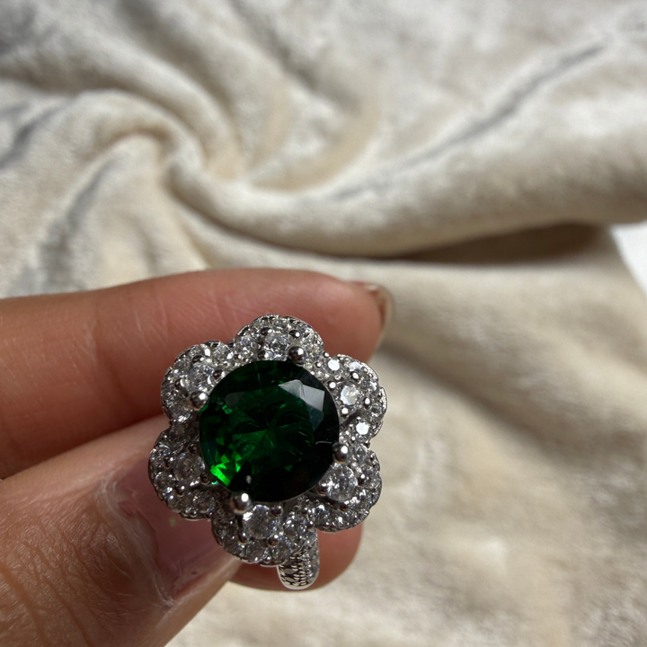 Green gemstone floral halo ring with lab-grown diamonds by Kiashaa Jewellery.