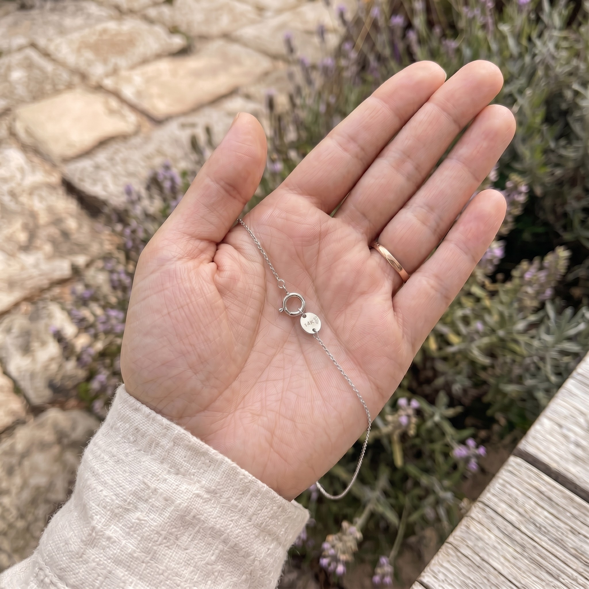 Blue pear gemstone and lab-grown diamond floral bracelet by Kiashaa Jewellery.