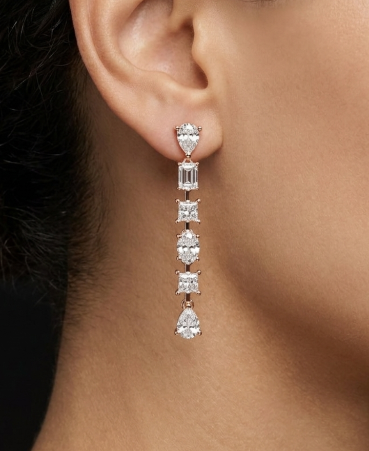 Model wearing 2.860 CTW multi-shape lab-grown diamond drop earrings by Kiashaa Jewellery.