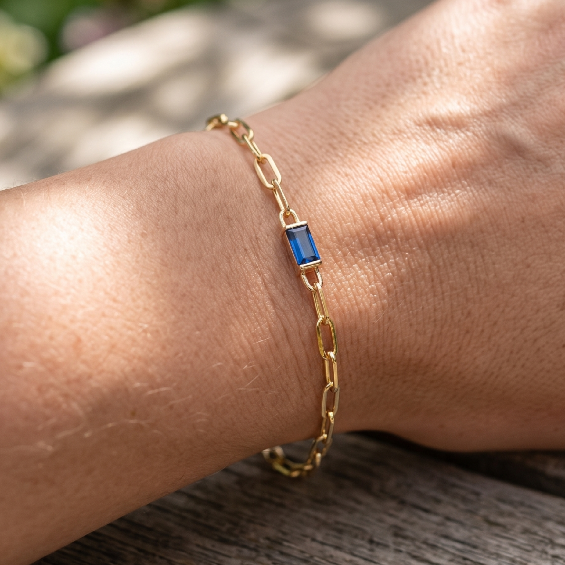 Kiashaa Jewellery 2.58 CT blue emerald-cut link bracelet in polished yellow gold.