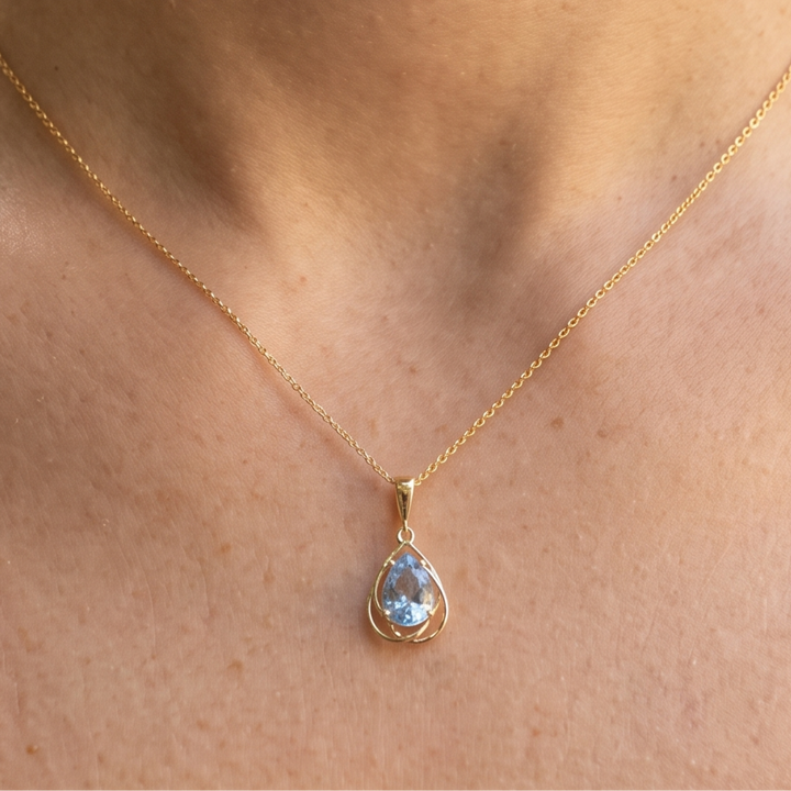 Aqua Teardrop 0.78 CT pear pendant necklace by Kiashaa Jewellery featuring a 7 × 5 mm light blue pear center stone.