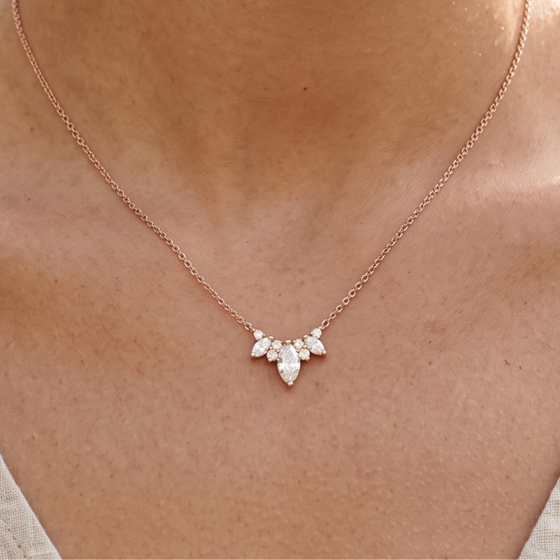 Kiashaa Jewellery 1.03 CTW marquise and round diamond cluster necklace in rose gold.