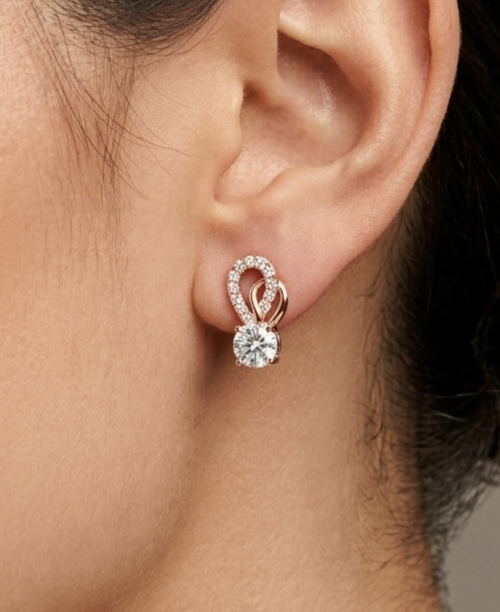Model wearing 1.00 CTW round lab-grown diamond loop stud earrings by Kiashaa Jewellery.