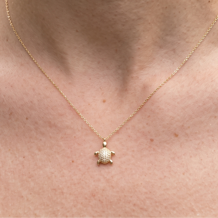 Kiashaa Jewellery 0.37 CTW diamond turtle pendant necklace in polished yellow gold.