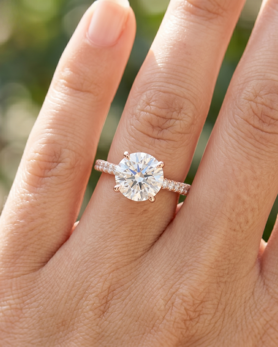 2.304 carat round lab-grown diamond ring by Kiashaa Jewellery in rose gold with a delicate diamond band.