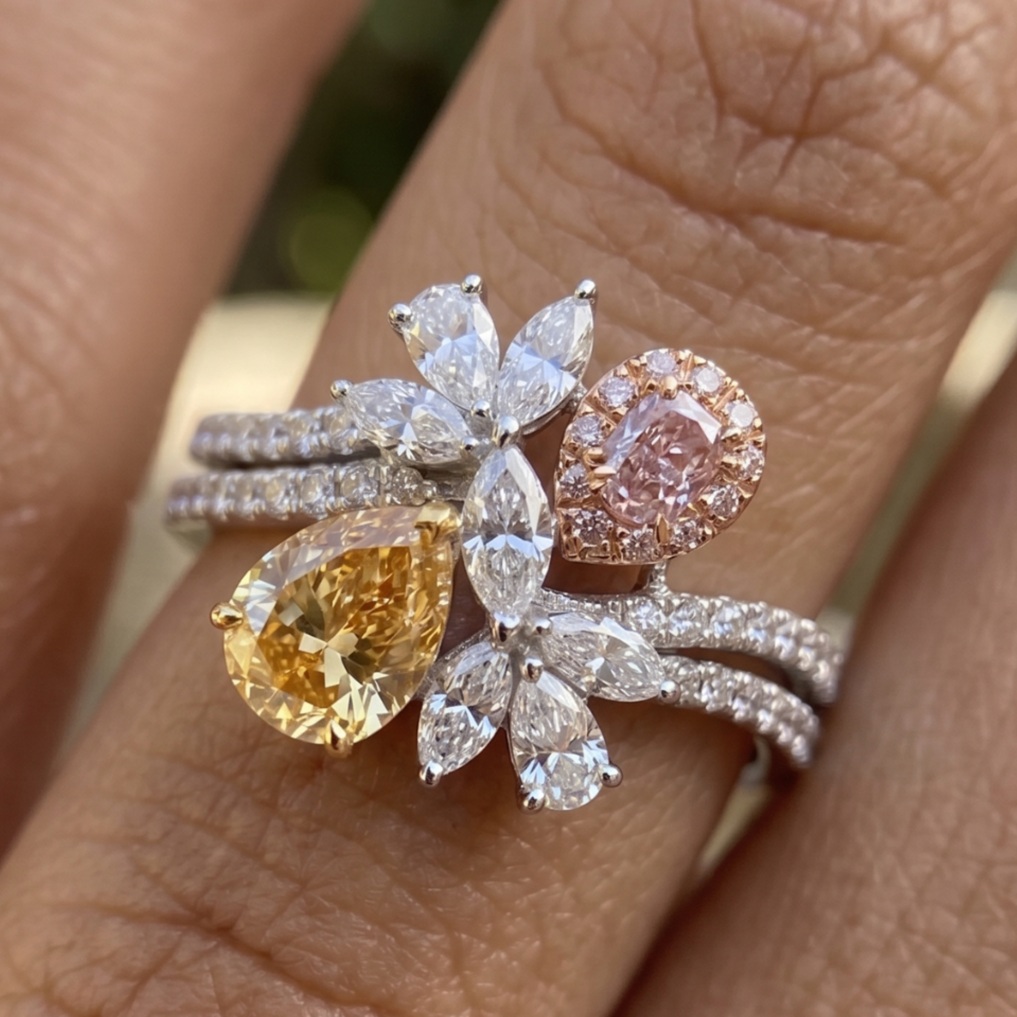 Aurora Bloom 3 CTW multi-color diamond floral ring by Kiashaa Jewellery with yellow and pink pear-shaped diamonds.