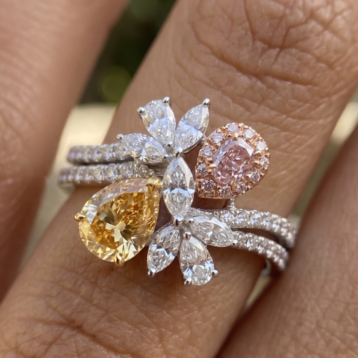 Aurora Bloom 3 CTW multi-color diamond floral ring by Kiashaa Jewellery with yellow and pink pear-shaped diamonds.