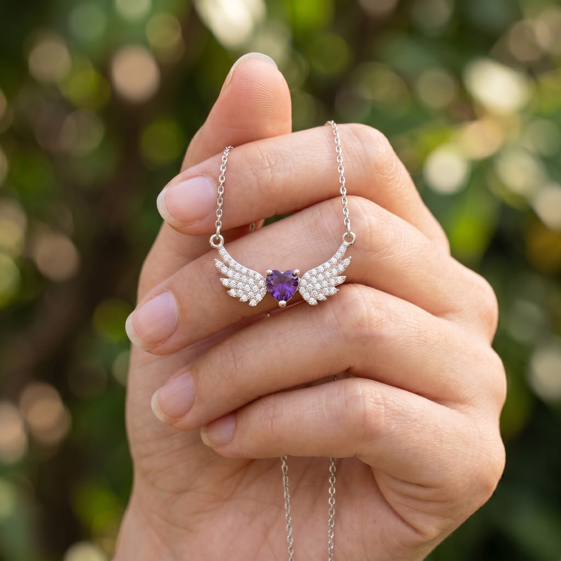Purple heart gemstone angel wing pendant necklace in rose gold by Kiashaa Jewellery.