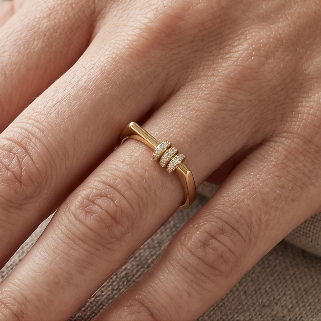 Kiashaa Jewellery 0.21 CTW triple-row diamond ring in polished yellow gold.