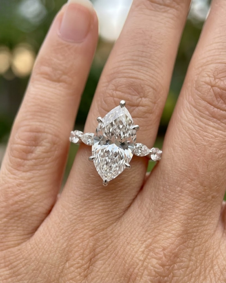 4.912 CT marquise lab-grown diamond ring by Kiashaa Jewellery with marquise and round accents in rose gold.