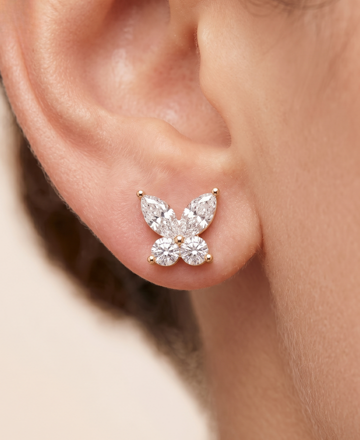 1.190 CTW marquise and round lab-grown diamond butterfly stud earrings in rose gold by Kiashaa Jewellery.