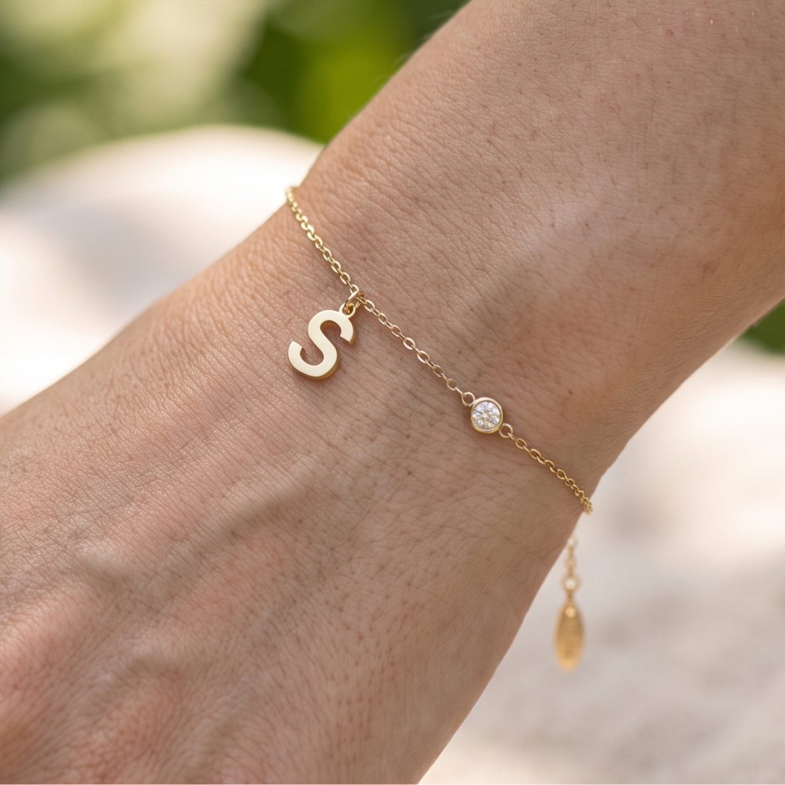 Kiashaa Jewellery personalized initial bracelet with 2.5 mm round diamond in yellow gold.