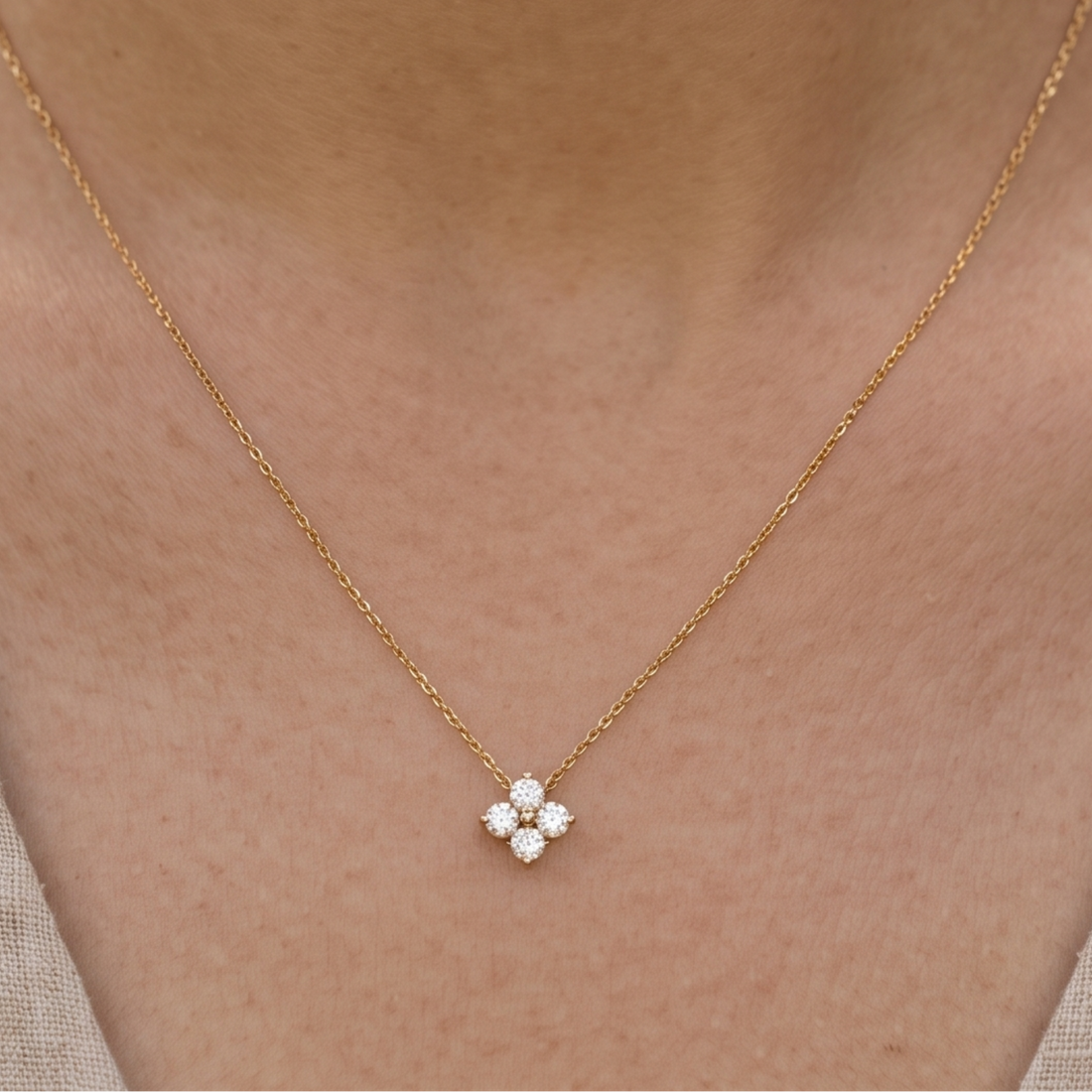 Kiashaa Jewellery 0.14 CTW round diamond flower necklace in polished yellow gold.