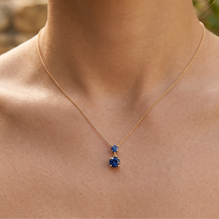 Kiashaa Jewellery 0.68 CTW blue round drop necklace in polished yellow gold.