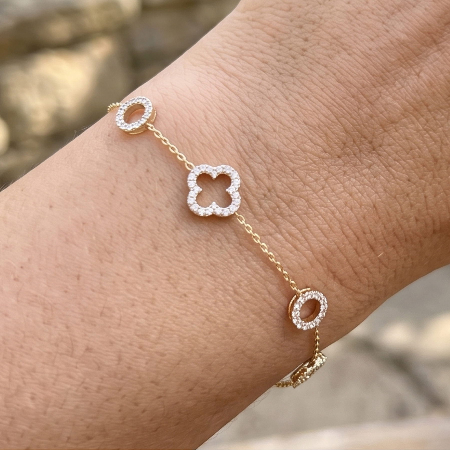 Kiashaa Jewellery 0.875 CTW diamond clover station bracelet in polished yellow gold.