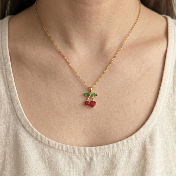 Green diamond and red gemstone necklace by Kiashaa Jewellery handcrafted in polished white gold.