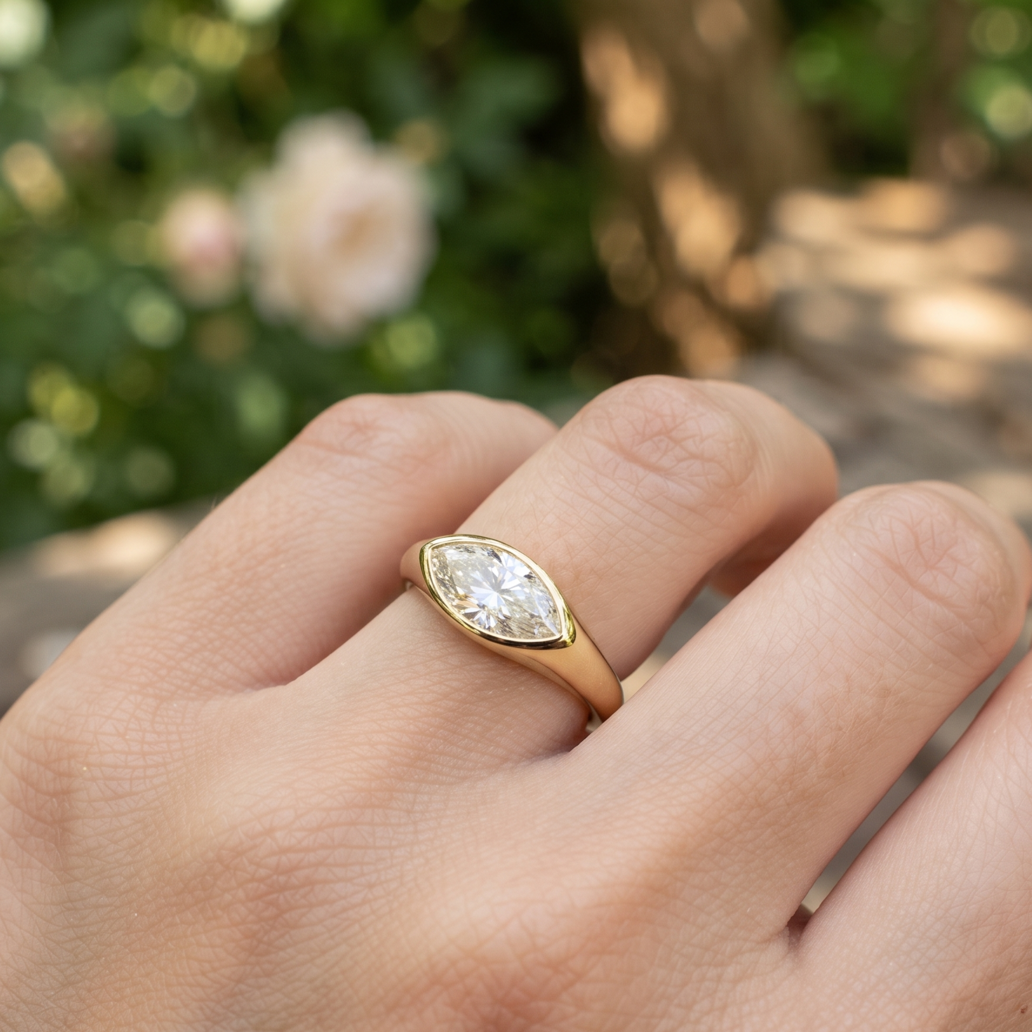 Kiashaa Jewellery 1.76 CT marquise bezel diamond ring in polished yellow gold.
