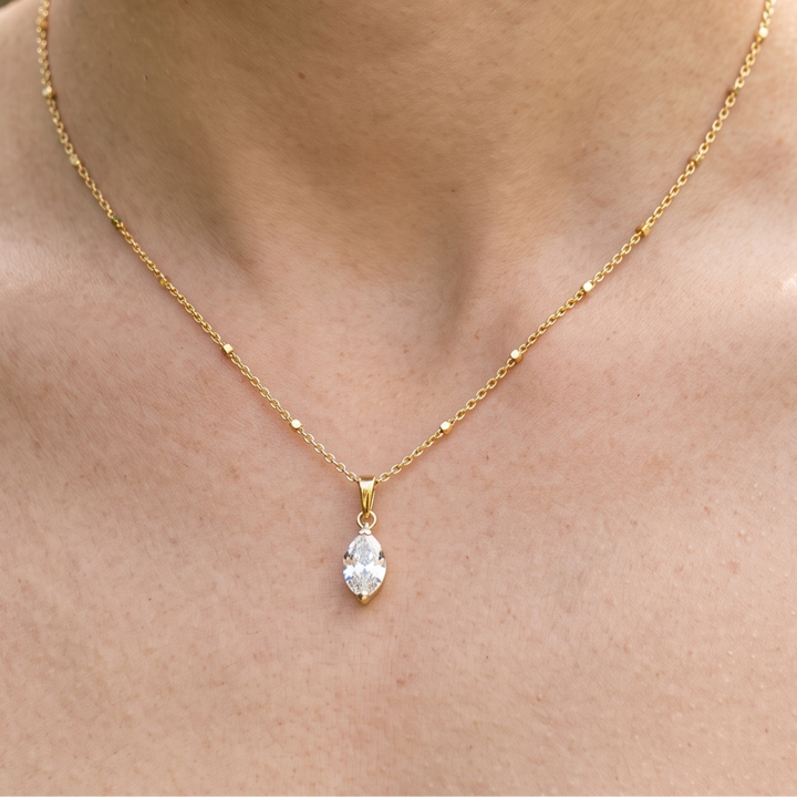 Eternal Marquise 0.66 CT solitaire pendant necklace by Kiashaa Jewellery featuring a 9 × 4.5 mm marquise center stone.