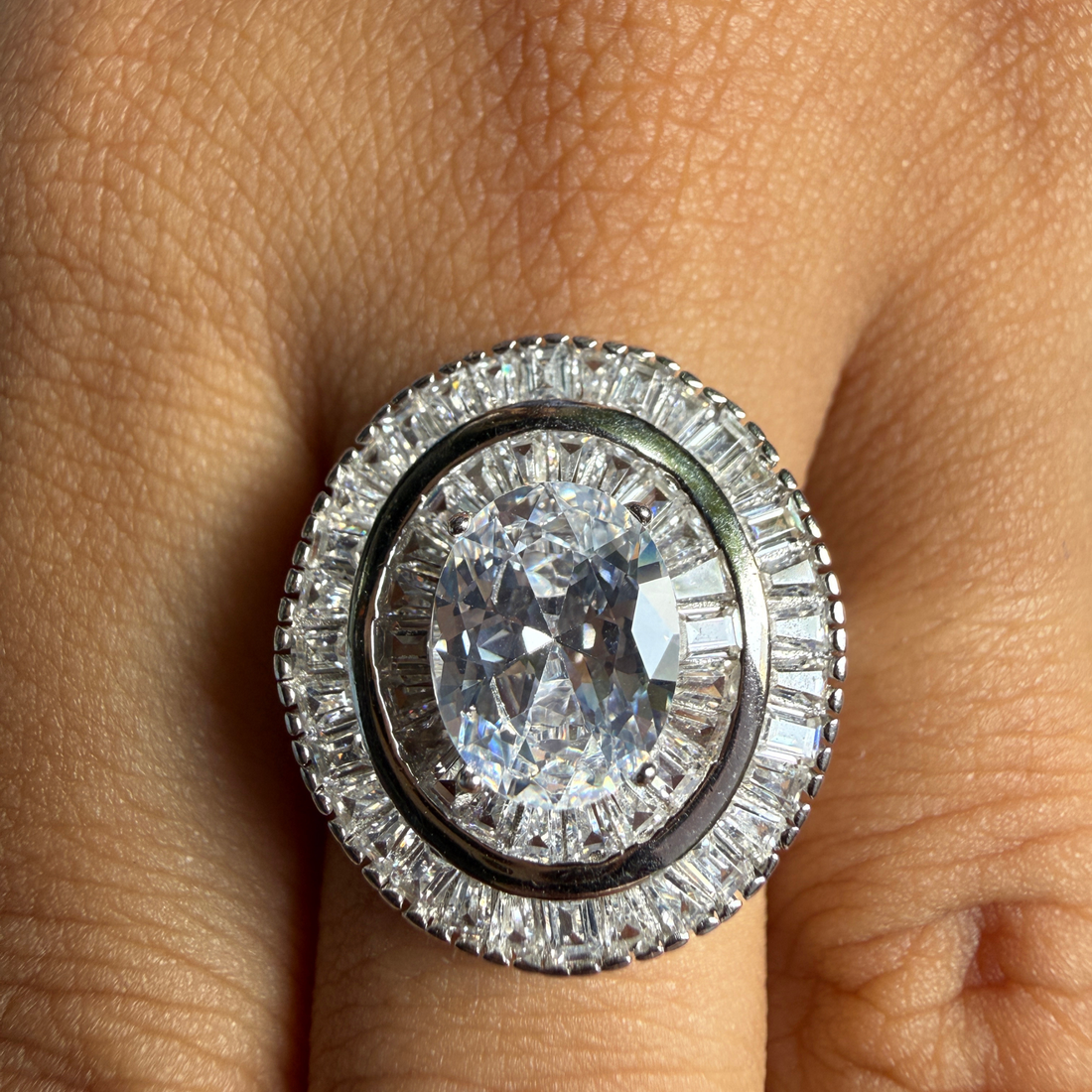 Oval and baguette lab-grown diamond double halo ring by Kiashaa Jewellery.