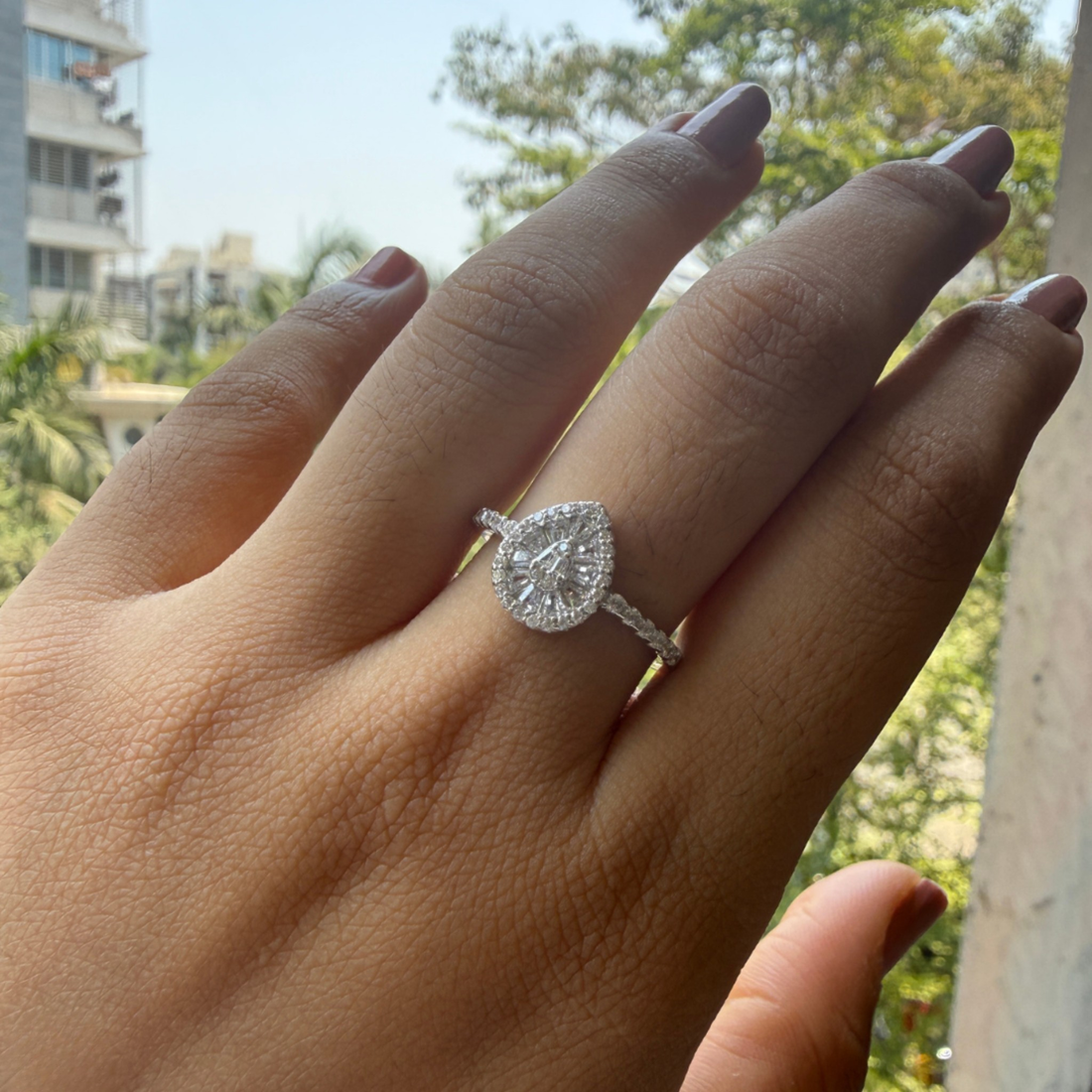 Luxury pear cluster engagement ring handcrafted in 9K, 14K and 18K gold.