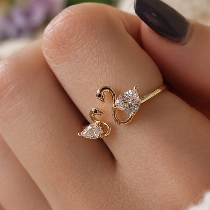 Swan Embrace 2.50 CTW lab-grown diamond ring by Kiashaa Jewellery with a 2 CT heart center and 0.50 CT pear side diamond.