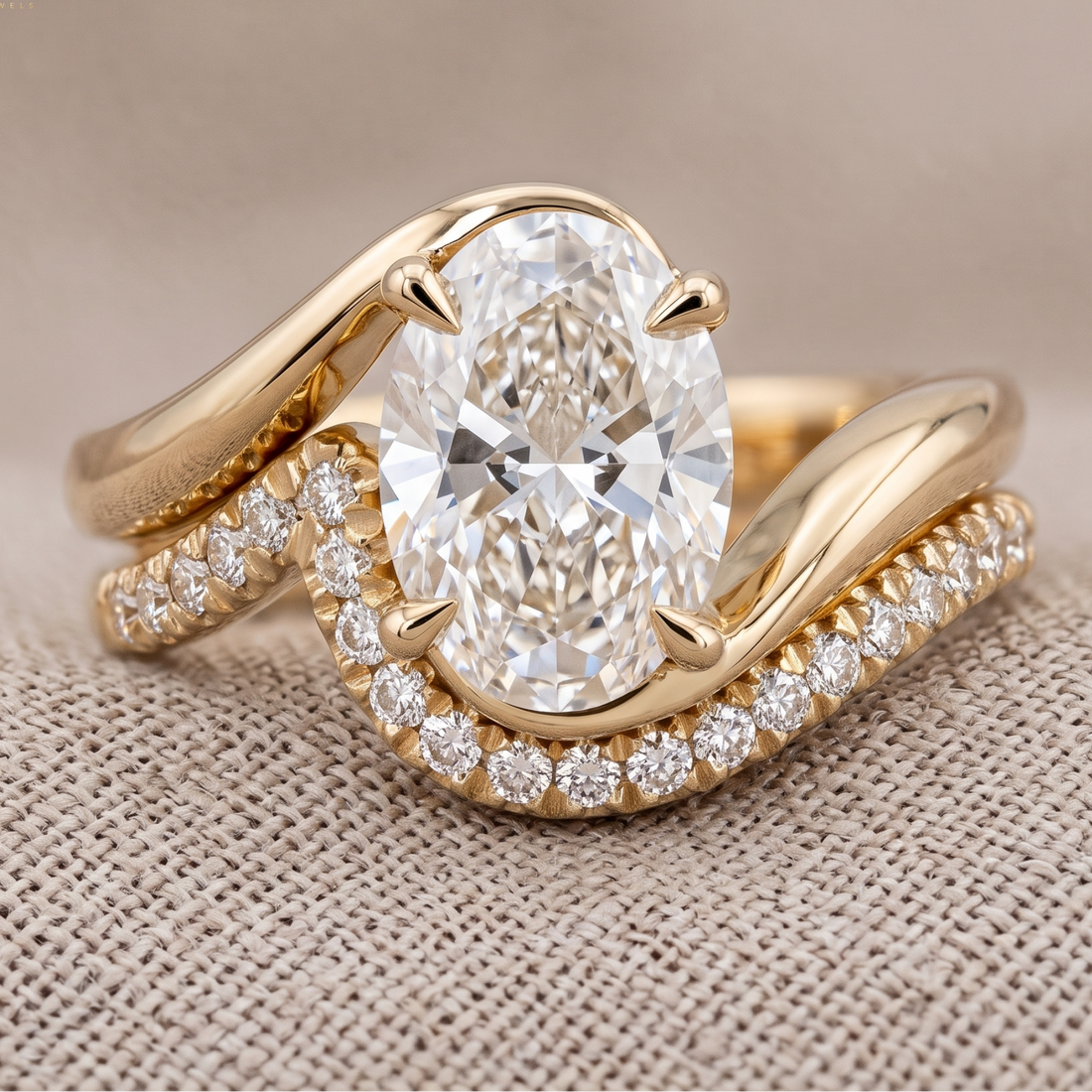 1.33 CT oval diamond sculptural bridal ring set in yellow gold