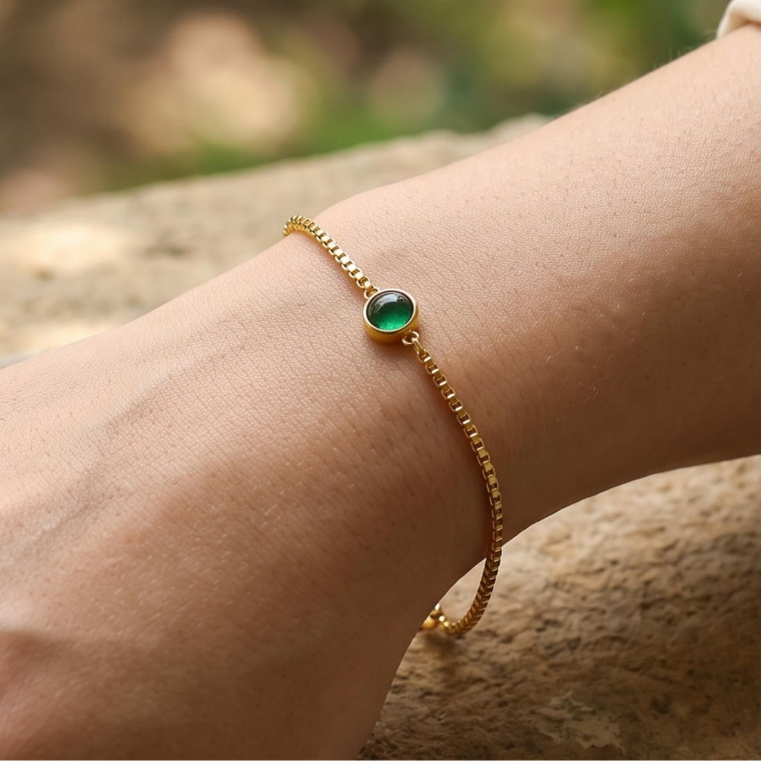 Kiashaa Jewellery 0.50 CT green oval gemstone bracelet in polished yellow gold.