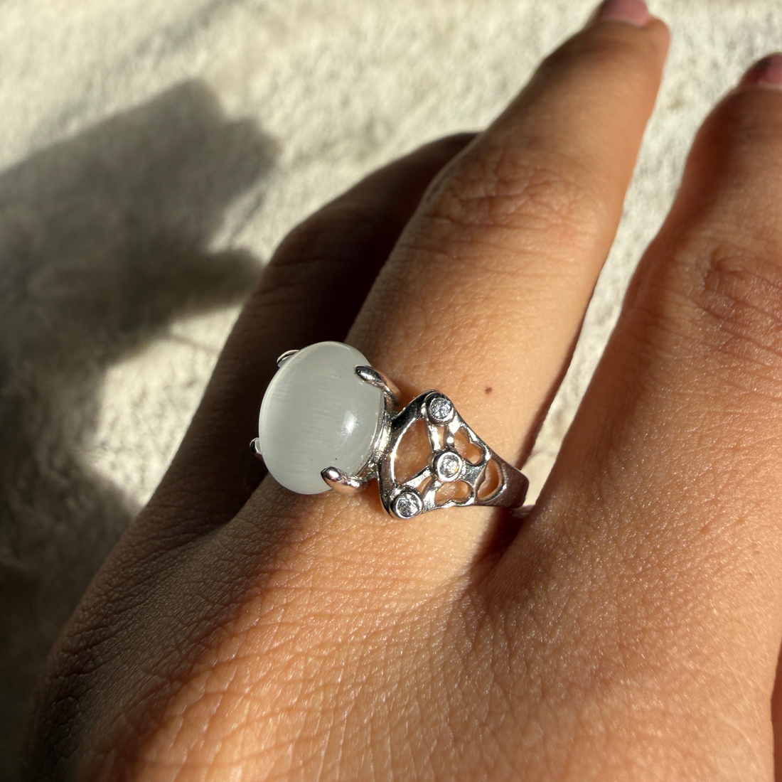 White cat's eye gemstone and lab-grown diamond ring by Kiashaa Jewellery.