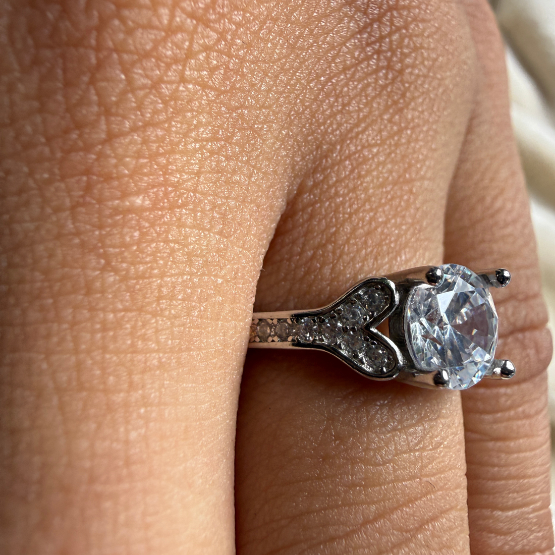 Round lab-grown diamond heart solitaire ring in white gold by Kiashaa Jewellery.