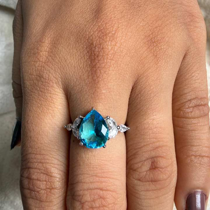 Blue pear gemstone and marquise lab-grown diamond ring by Kiashaa Jewellery.