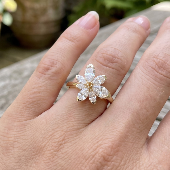 Élan Bloom 2 CTW pear diamond flower ring by Kiashaa Jewellery featuring approximately seven pear-shaped diamond petals.