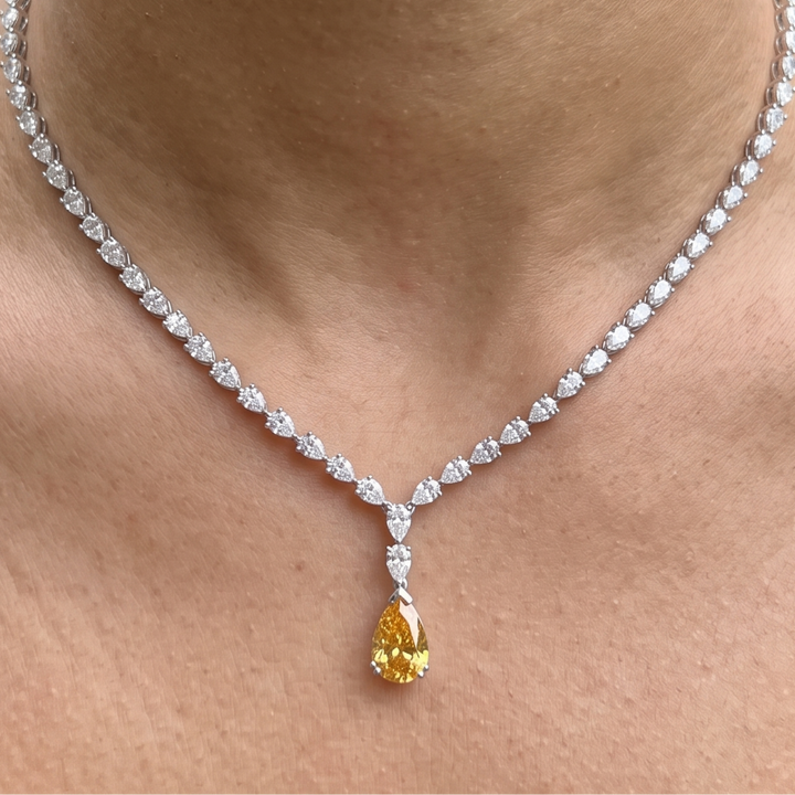 Luxury statement necklace featuring 74 listed pear-shaped stones in a graduated arrangement.