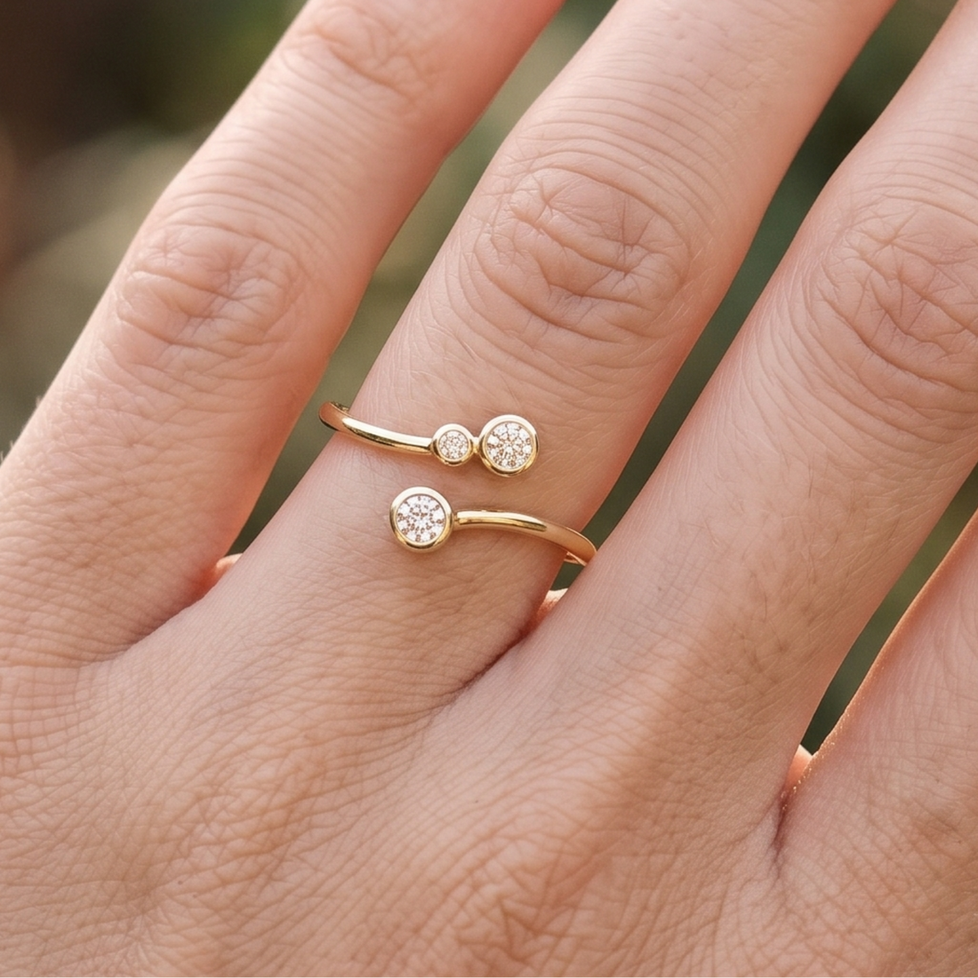 Kiashaa Jewellery 0.295 CTW round diamond open bypass ring in polished yellow gold.
